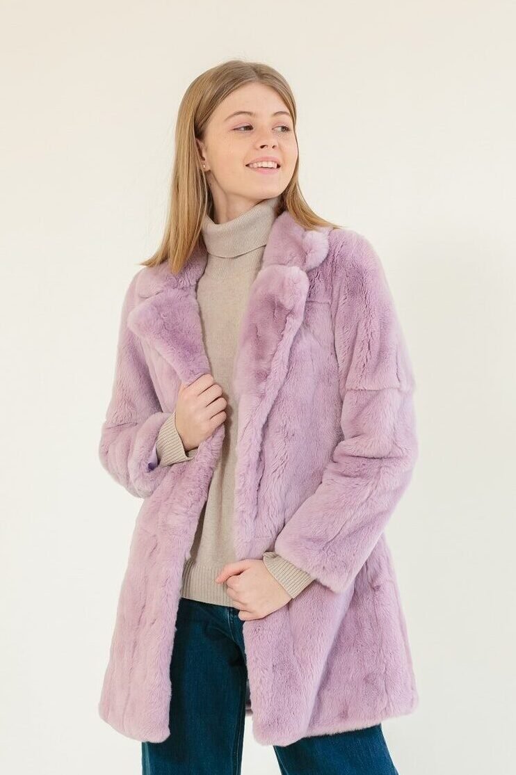 beautiful-girl-wearing-high-fashionable-spring-fall-clothing-posing-in-the-showroom-2-e1703780871480.jpg